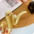 spinka-klamra-do-wlosow-zlota-z-perla.webp